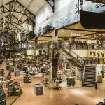 Ascend kayak sold at Bass Pro Shops on a calm river