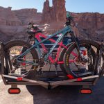 Outfitrer backpack and camping equipment laid out for an expedition